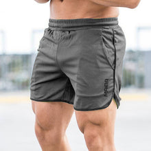 Afbeelding in Gallery-weergave laden, Sportshort met monogram voor heren in effen kleur
