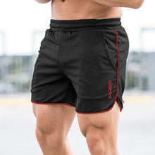 Afbeelding in Gallery-weergave laden, Sportshort met monogram voor heren in effen kleur