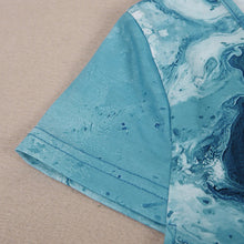Afbeelding in Gallery-weergave laden, Mini-jurk met V-hals en blauwe print