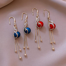 Afbeelding in Gallery-weergave laden, Elegante pauwenoorbellen (2 kleuren)