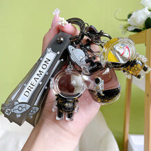 Afbeelding in Gallery-weergave laden, Drijvende Astronaut Sleutelhanger