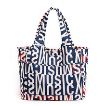 Afbeelding in Gallery-weergave laden, Handtas met modeprint