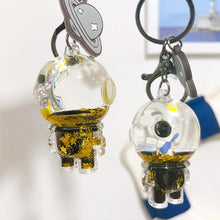 Afbeelding in Gallery-weergave laden, Drijvende Astronaut Sleutelhanger