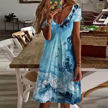 Afbeelding in Gallery-weergave laden, Mini-jurk met V-hals en blauwe print
