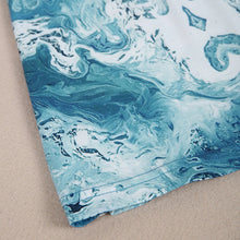 Afbeelding in Gallery-weergave laden, Mini-jurk met V-hals en blauwe print
