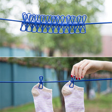 Afbeelding in Gallery-weergave laden, Portable Elastic Travel Clothes Rack
