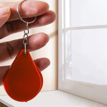 Afbeelding in Gallery-weergave laden, Opvouwbare sleutelhanger met vergrootglas

