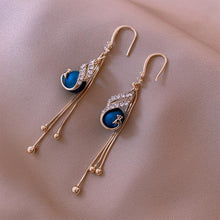 Afbeelding in Gallery-weergave laden, Elegante pauwenoorbellen (2 kleuren)
