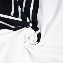 Afbeelding in Gallery-weergave laden, Zwart-witte midi-jurk met matrozen streep en zijzakken
